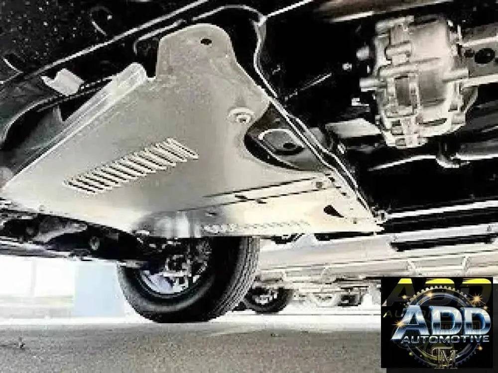 Car catalytic converter secured with a metal shield to prevent theft and enhance vehicle security