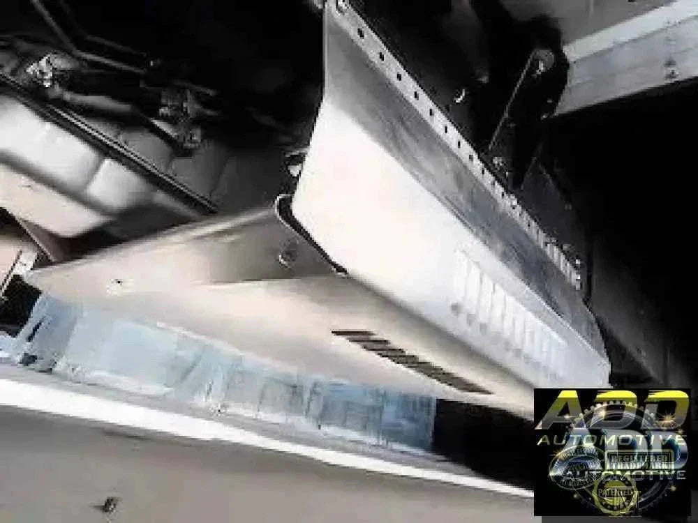 2015-2026 Isuzu 3500 & 4500 catalytic converter shield with louvers and security bolts installed on truck underbody