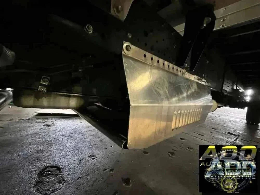 2015-2026 Isuzu 3500 & 4500 catalytic converter shield with marine-grade aluminum louvers and security bolts installed on truck underbody