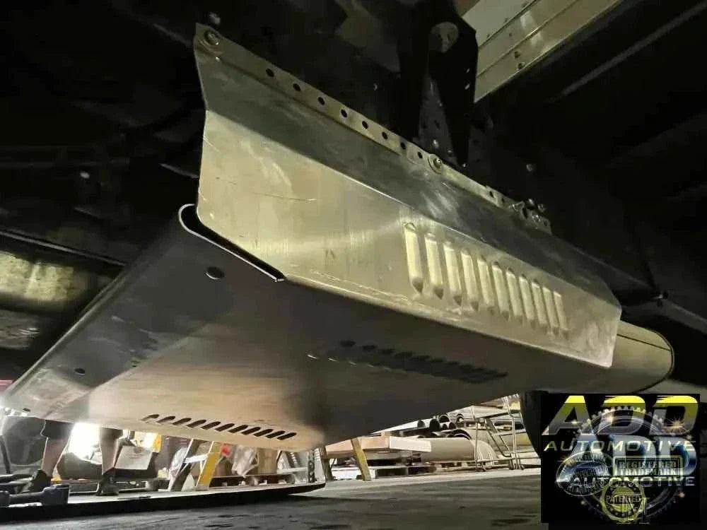 2015-2026 Isuzu 3500 & 4500 catalytic converter shield made of marine-grade aluminum with louvers and security bolts installed on truck underbody