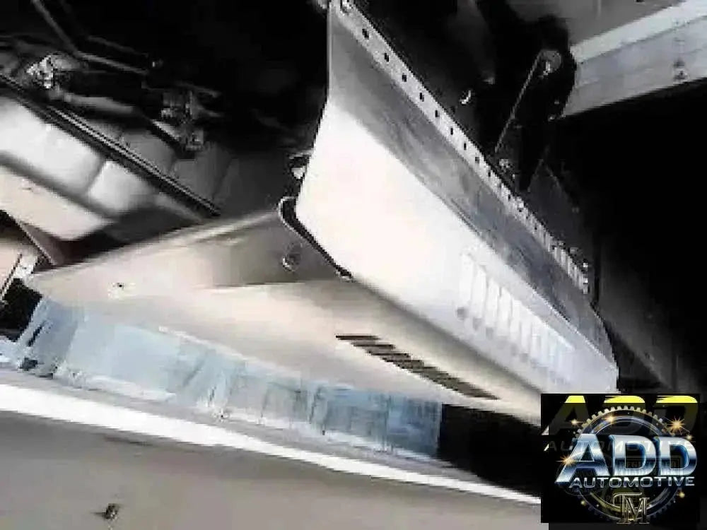 2015-2026 Isuzu 3500 & 4500 catalytic converter shield with louvers and security bolts installed on truck underbody