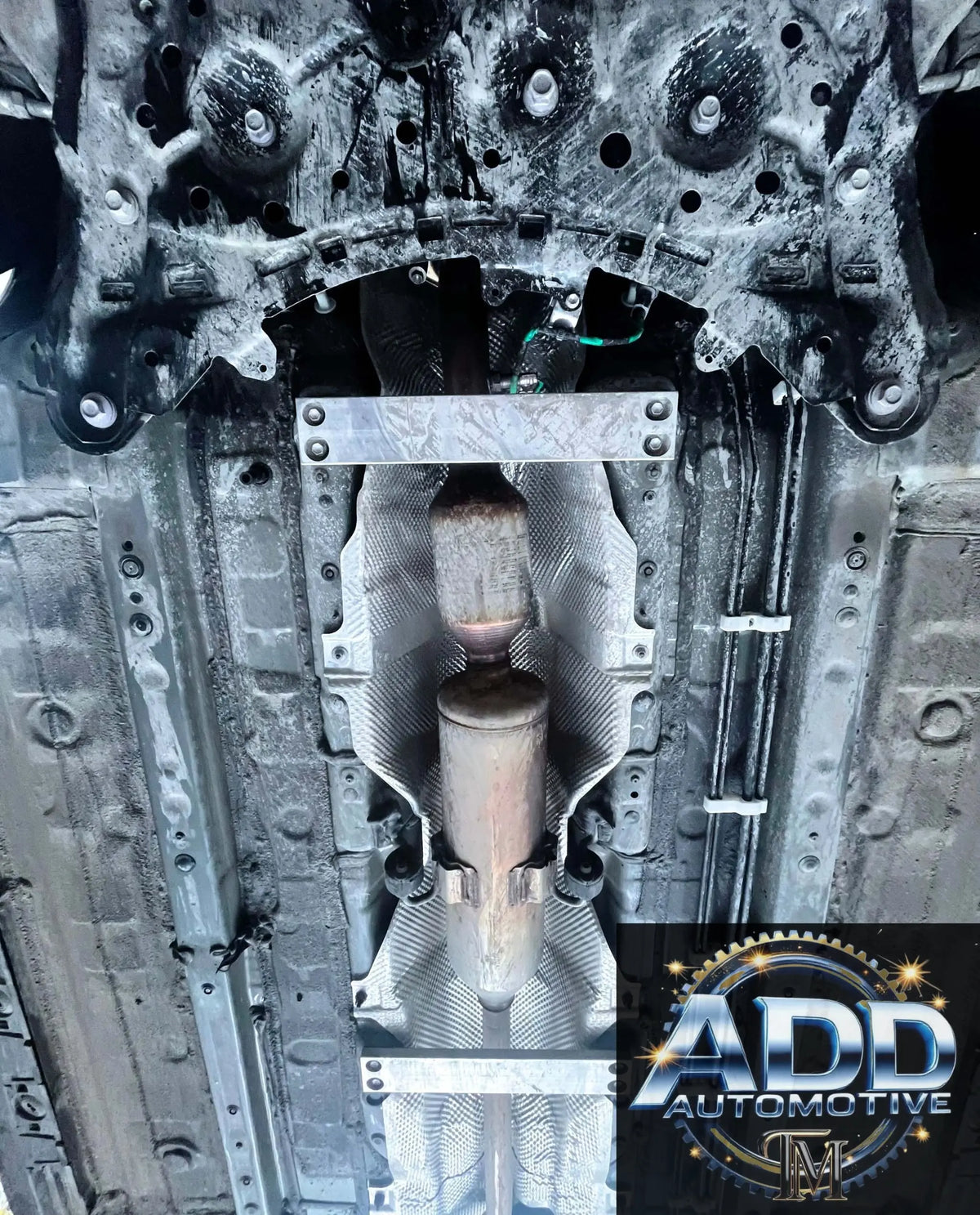 2020-2026 Toyota Corolla catalytic converter shield installed under vehicle for anti-theft protection