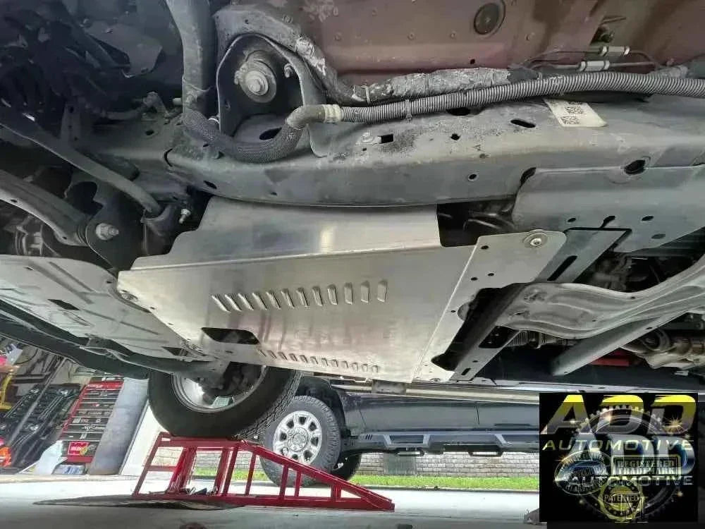 2021-2026 Ford F-150 PowerBoost catalytic converter aluminum shield with louvers and security bolts installed under truck