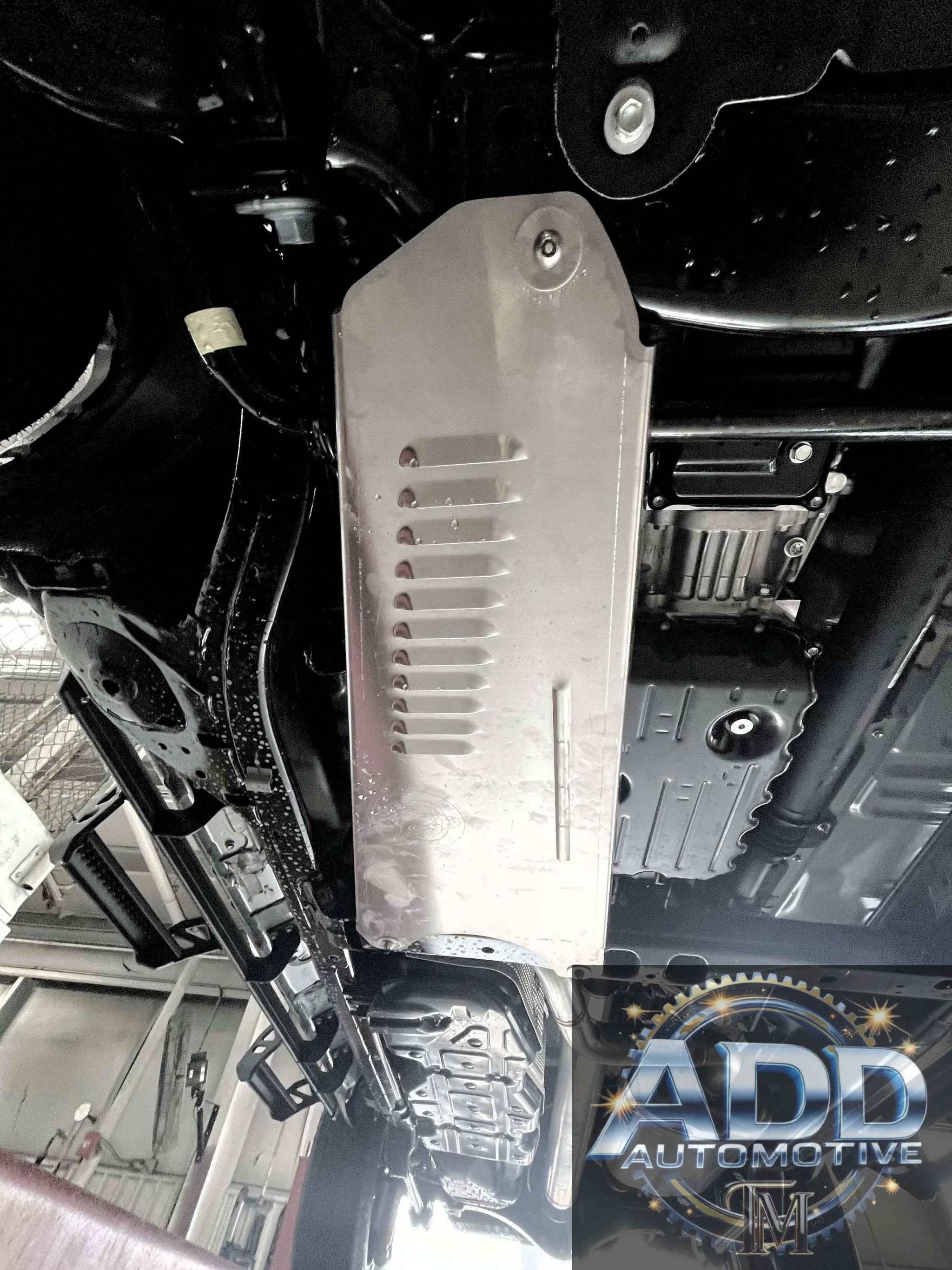 2024-2026 Toyota Tacoma Hybrid catalytic converter shield in marine grade aluminum with louvers and security bolts installed under truck