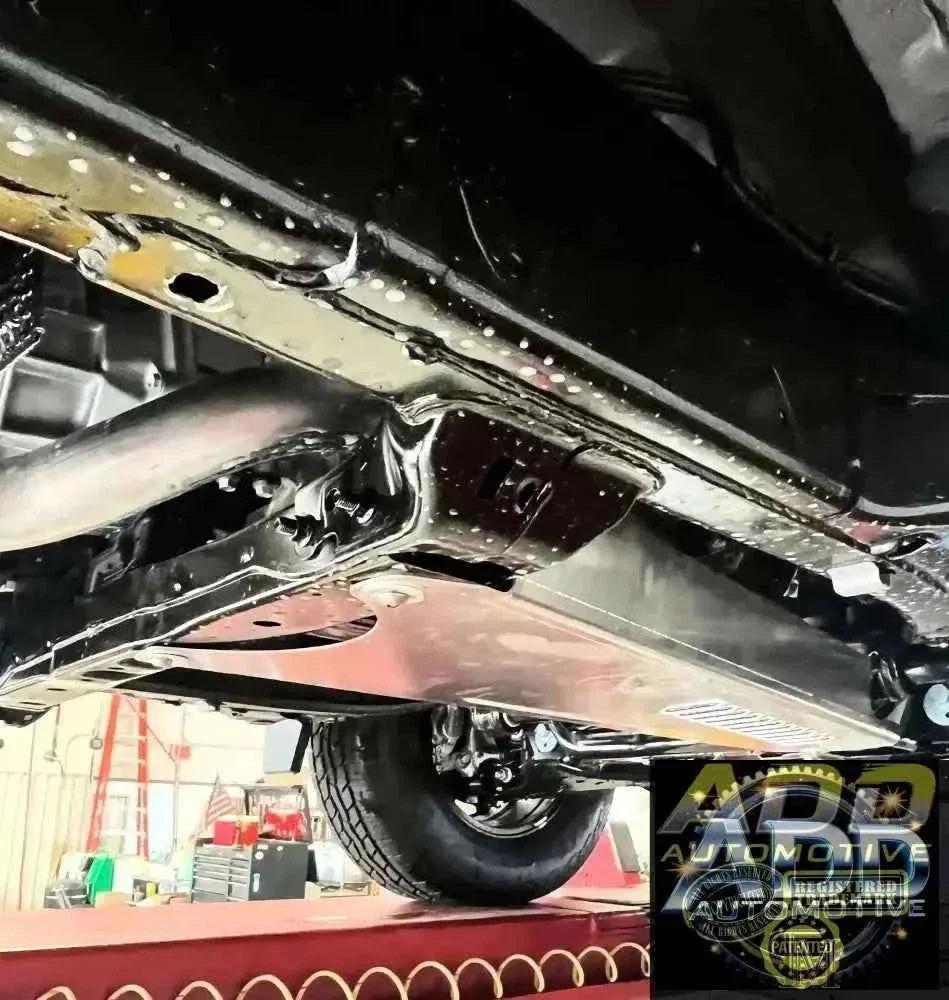 2024-2026 Toyota Tacoma catalytic converter shield made of marine-grade aluminum with louvered ventilation and tamper-resistant bolts installed under truck without drilling