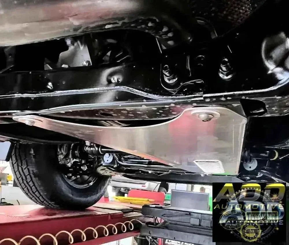 2024-2026 Toyota Tacoma catalytic converter shield made of marine-grade aluminum with tamper-resistant bolts and ventilation louvers installed under truck