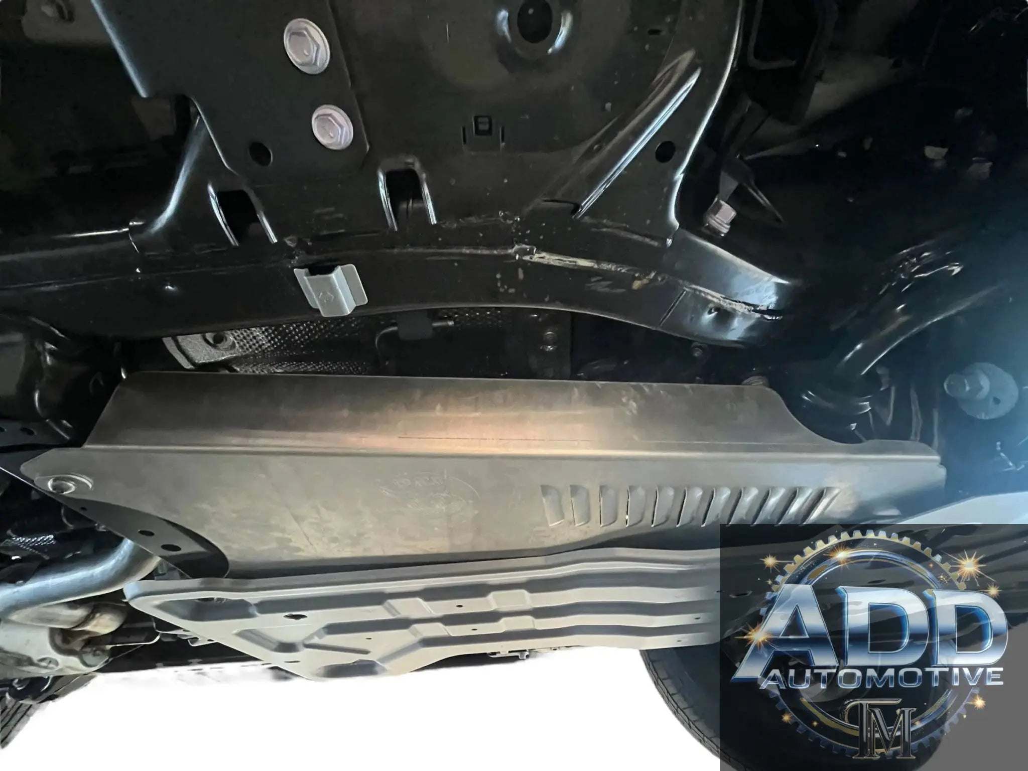 ADD A CAT 2024 Toyota Landcruiser catalytic converter shield by ADD Automotive installed underneath vehicle