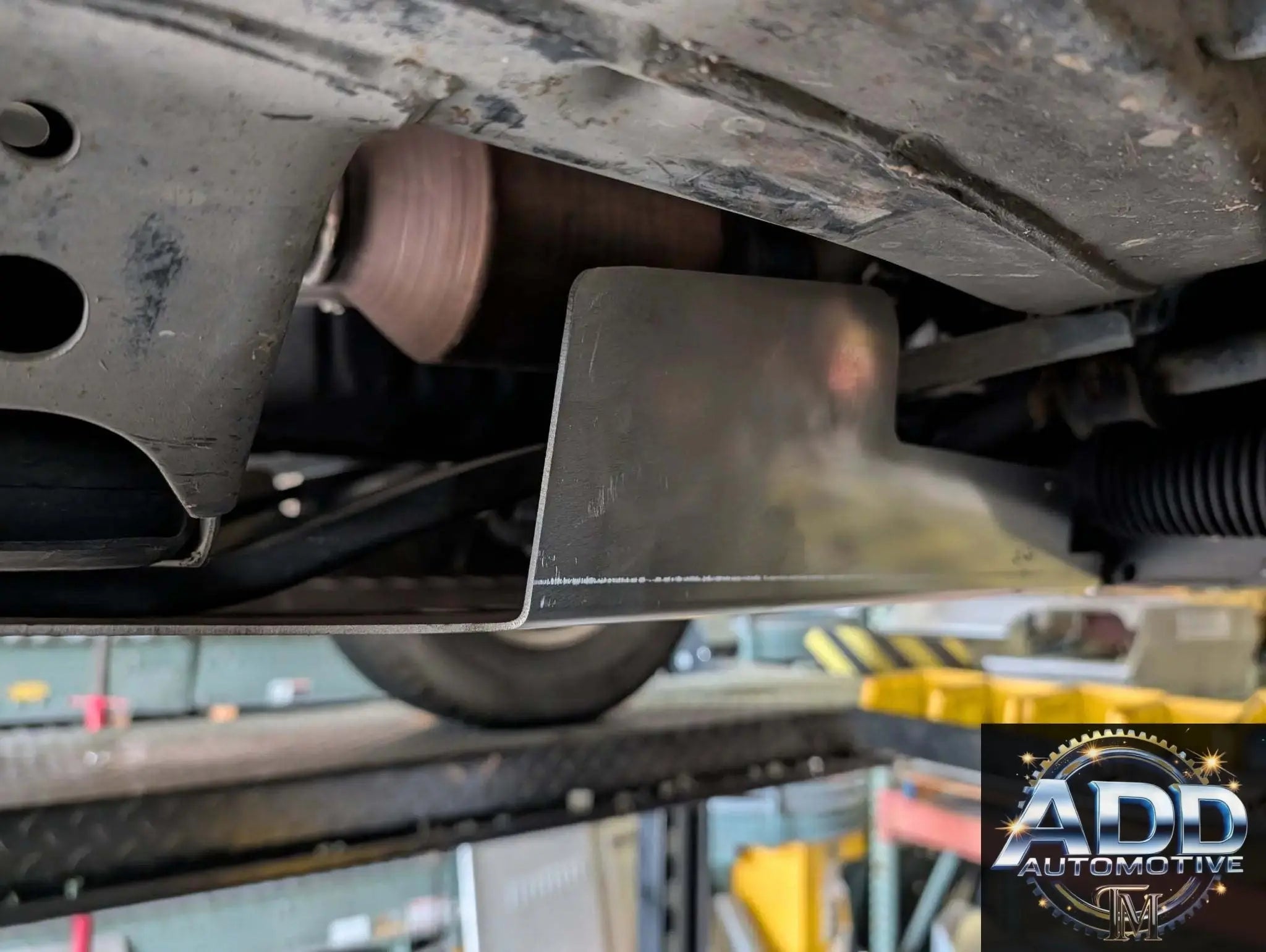 Toyota Sequoia catalytic converter shield made of marine-grade aluminum with louvers and security bolts for anti-theft protection