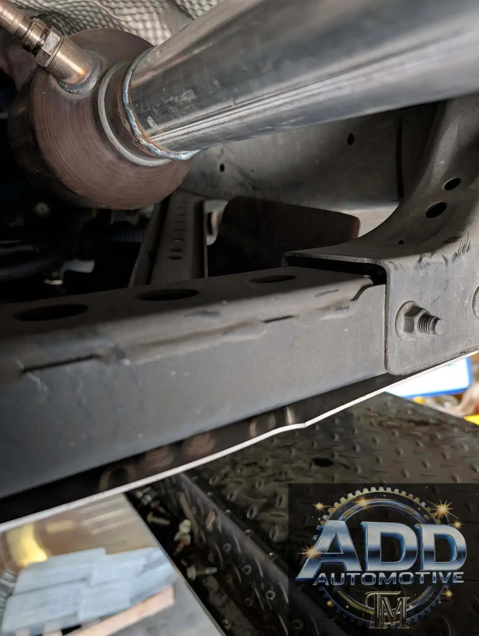 1999-2006 Toyota Tundra catalytic converter shield made of marine-grade aluminum with louvers and security bolts for anti-theft protection