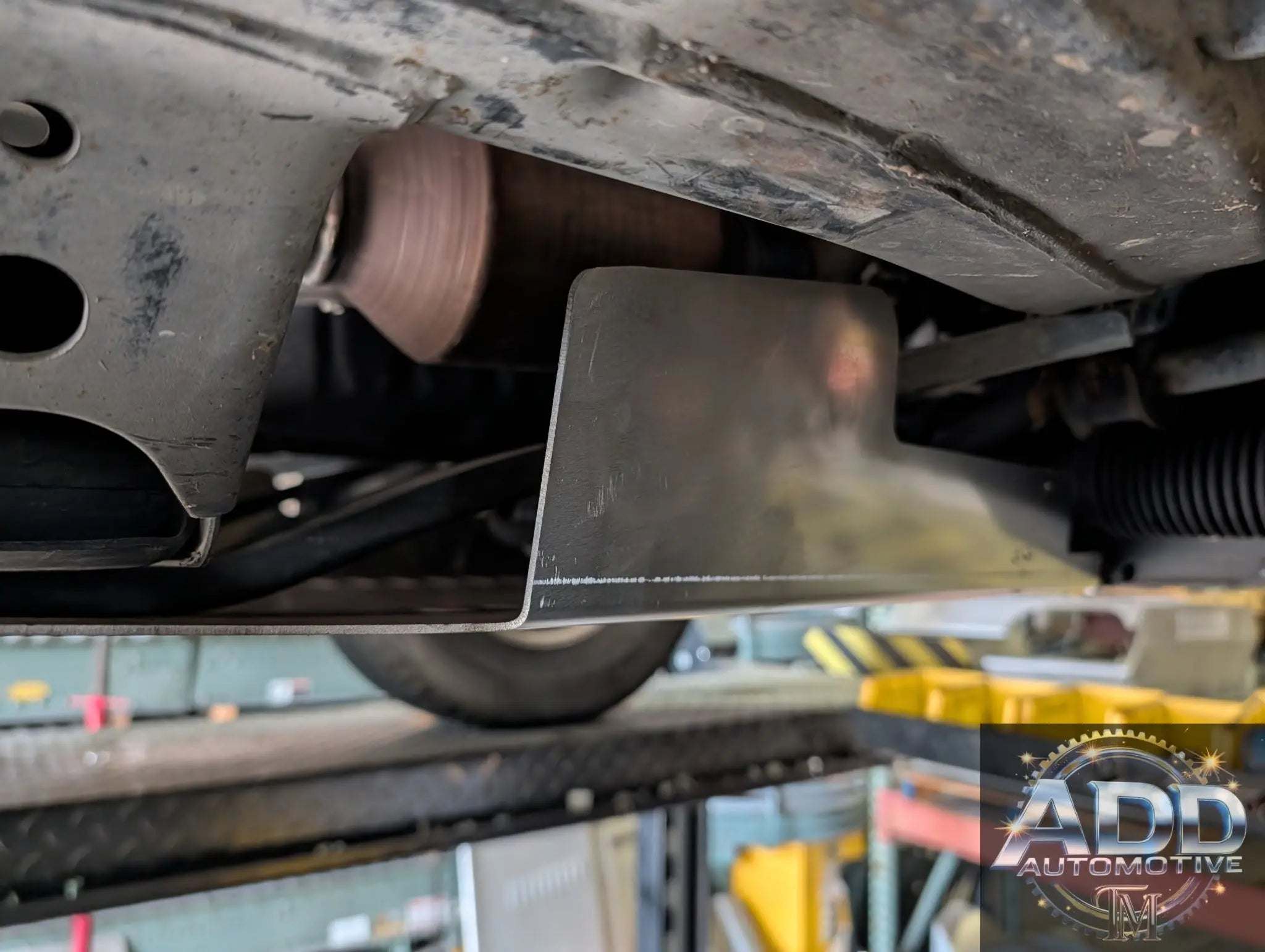 Toyota Sequoia catalytic converter shield made of marine-grade aluminum with louvers and security bolts for anti-theft protection