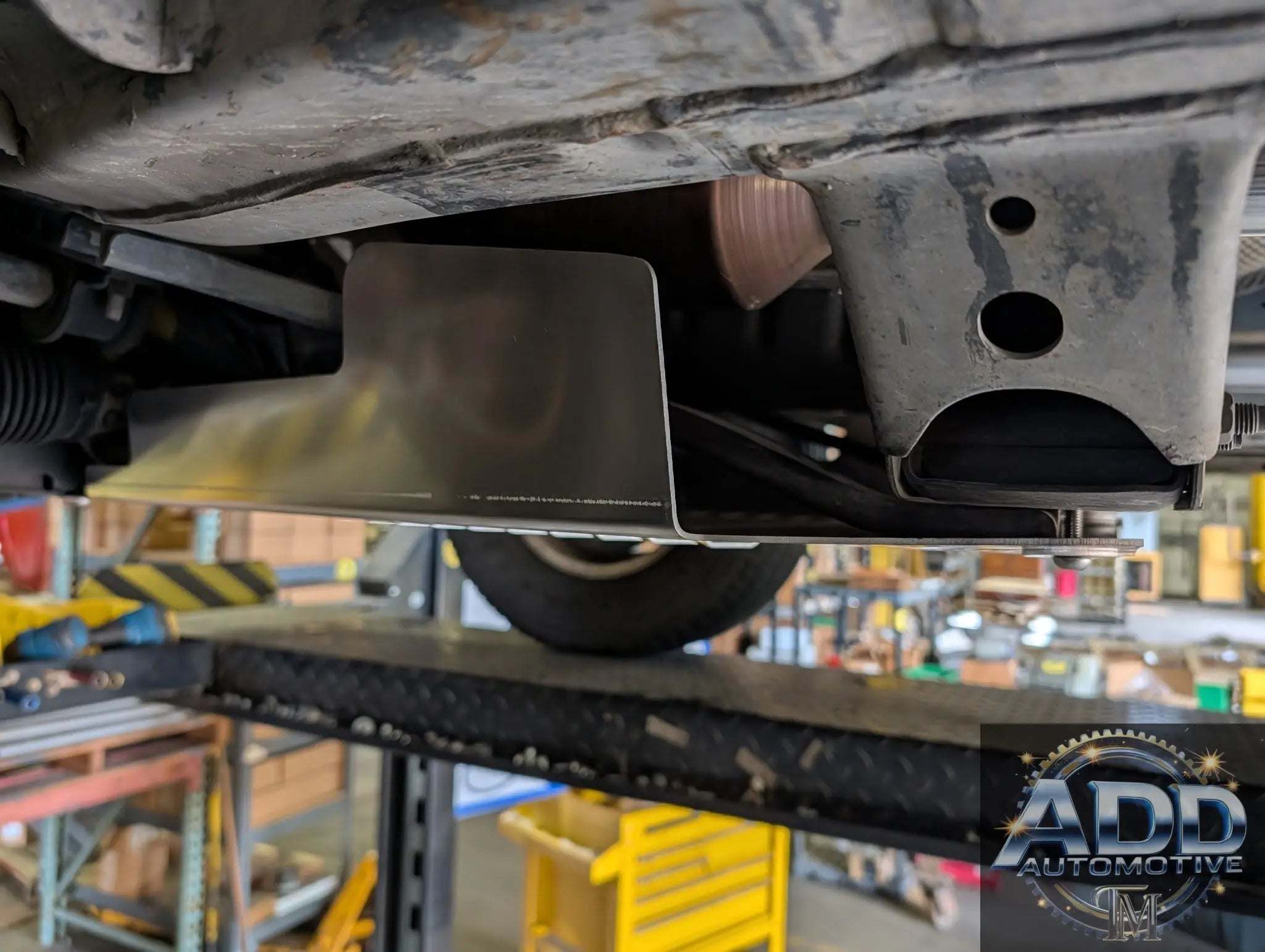 Toyota Tundra Catalytic Converter Shield made of marine-grade aluminum with security bolts and ventilation slots for 1999-2006 models
