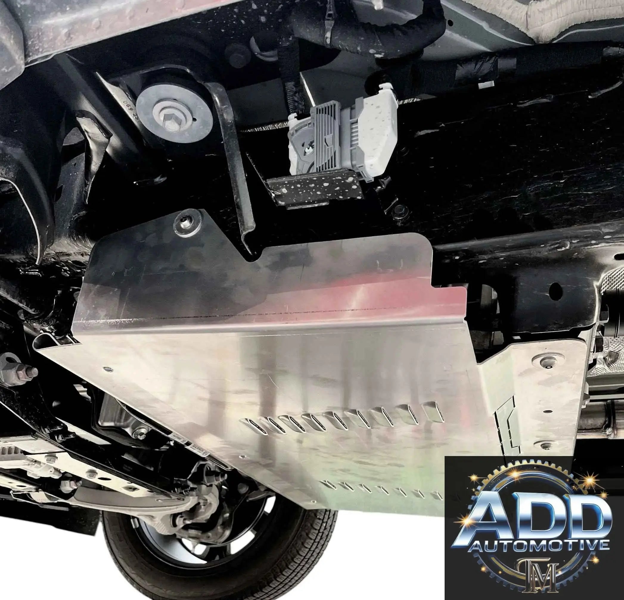 Ram 1500 Catalytic Converter Shield installed under truck protecting catalytic converter with aluminum shield and ventilation slots