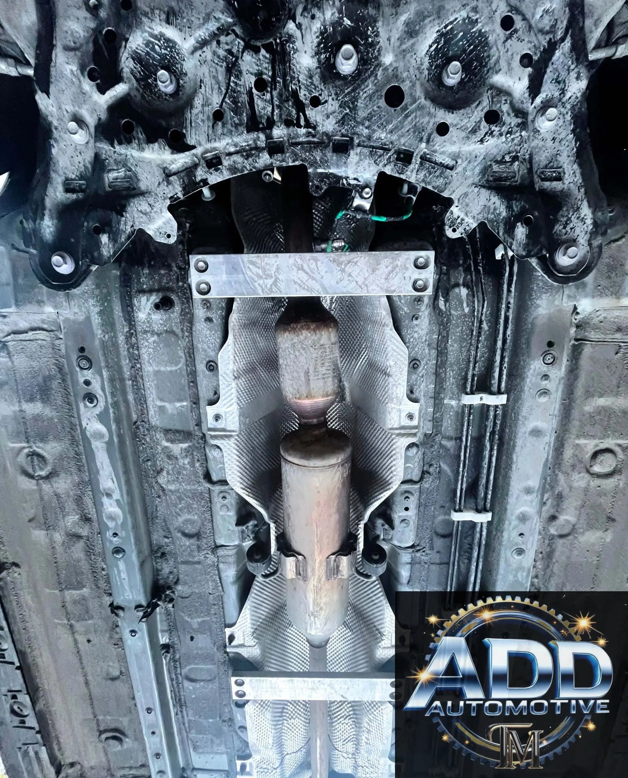 2020-2026 Toyota Corolla catalytic converter shield installed under vehicle for anti-theft protection
