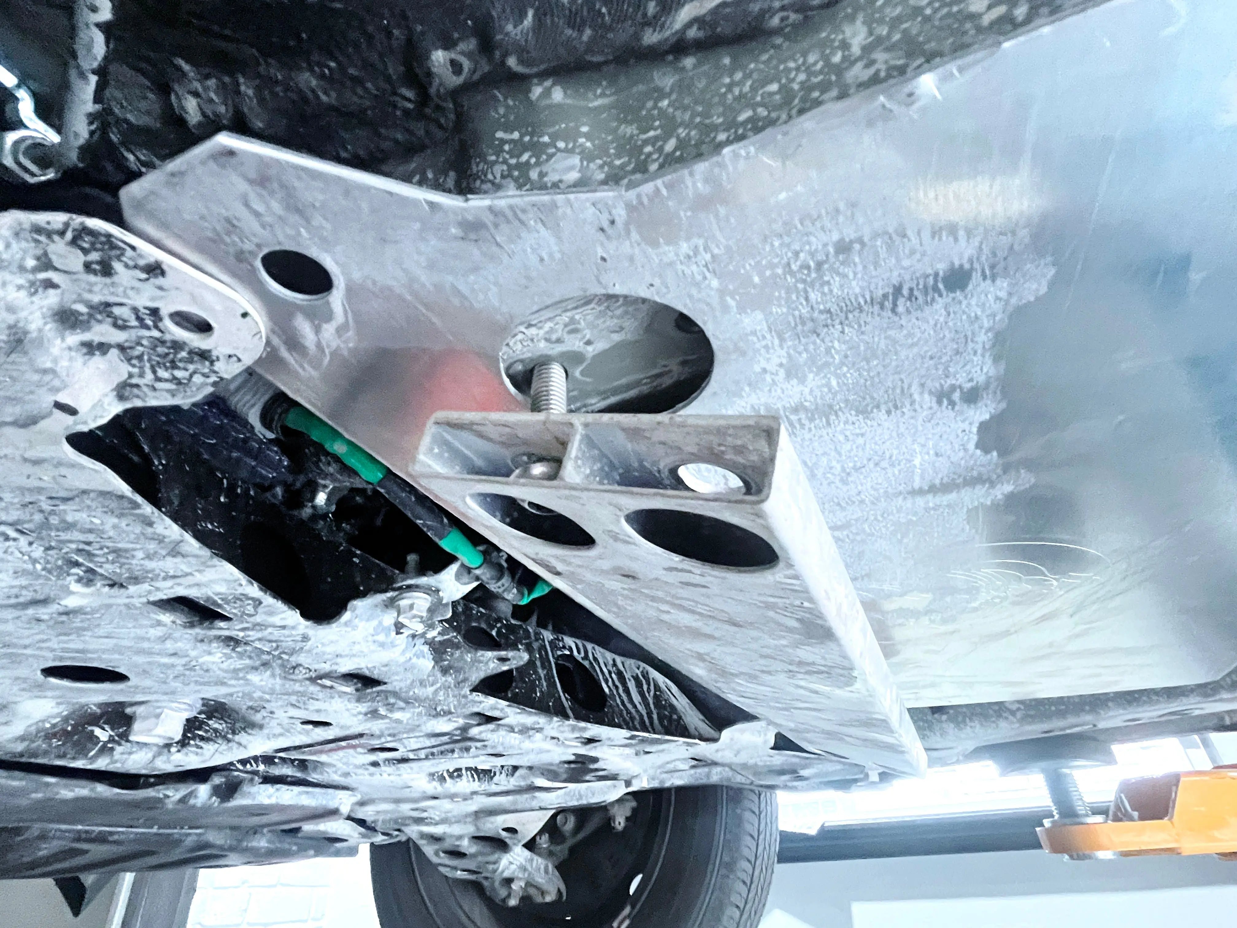 2020-2026 Toyota Corolla catalytic converter shield installed under vehicle for theft protection