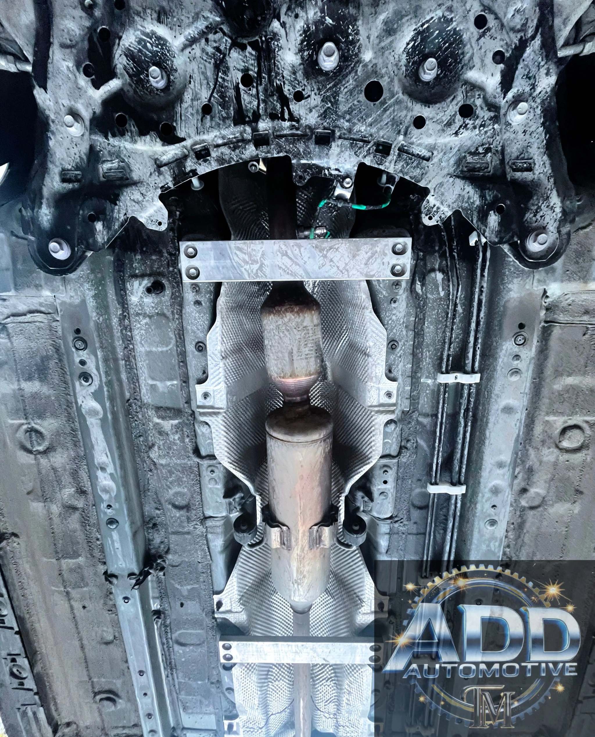 2020-2026 Toyota Corolla catalytic converter shield installed under vehicle for anti-theft protection