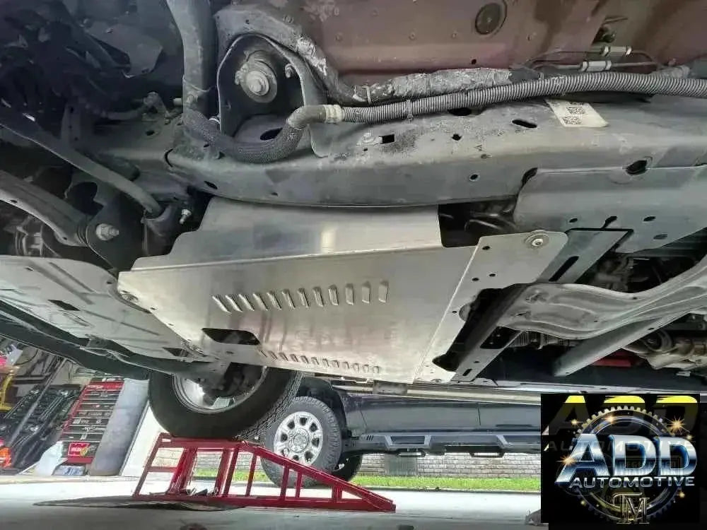 2021-2026 Ford F-150 PowerBoost catalytic converter aluminum shield with louvers and security bolts installed under truck