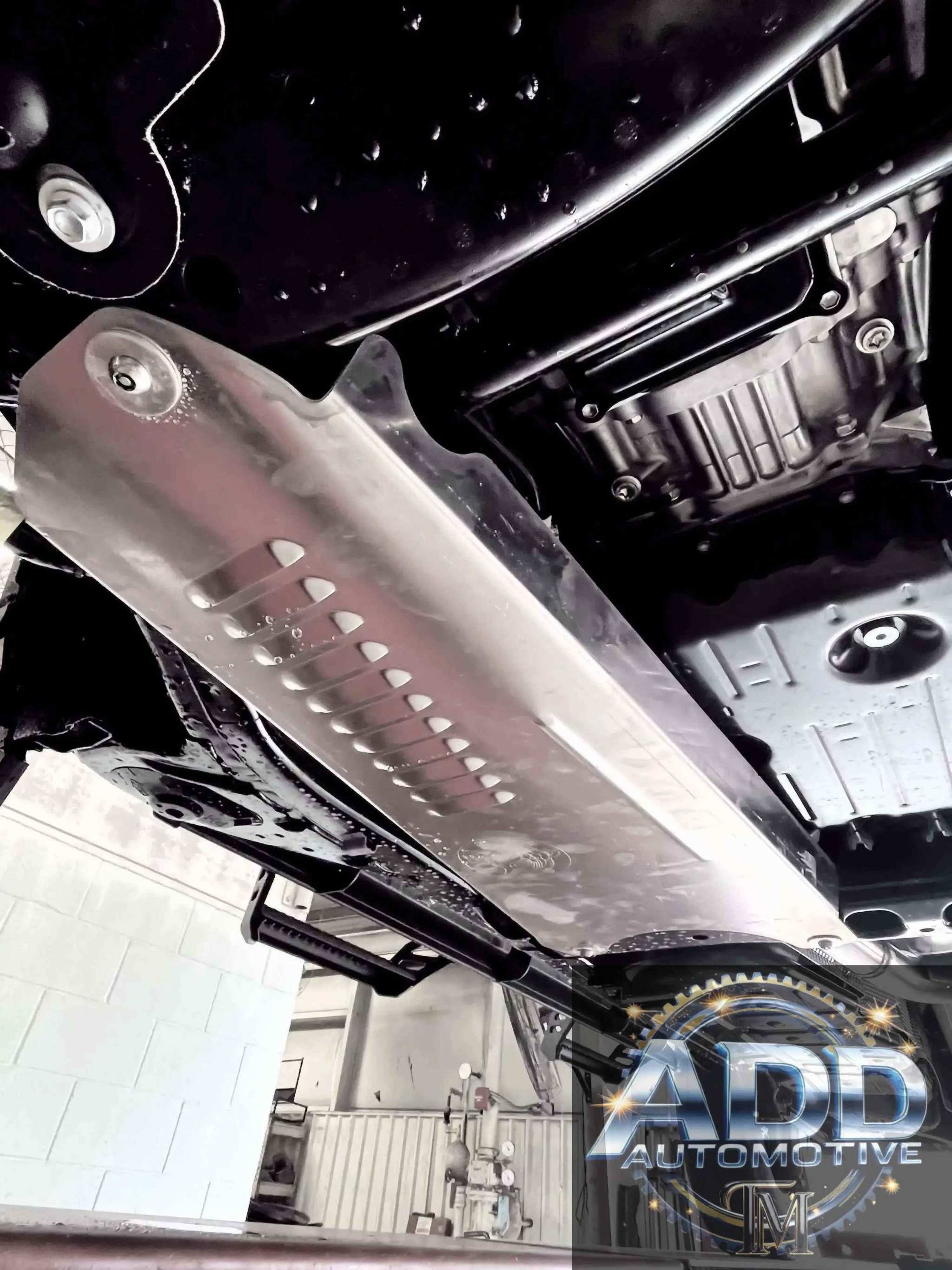 2024-2026 Toyota Tacoma Hybrid catalytic converter shield made of marine grade aluminum with louvers and security bolts installed under the vehicle