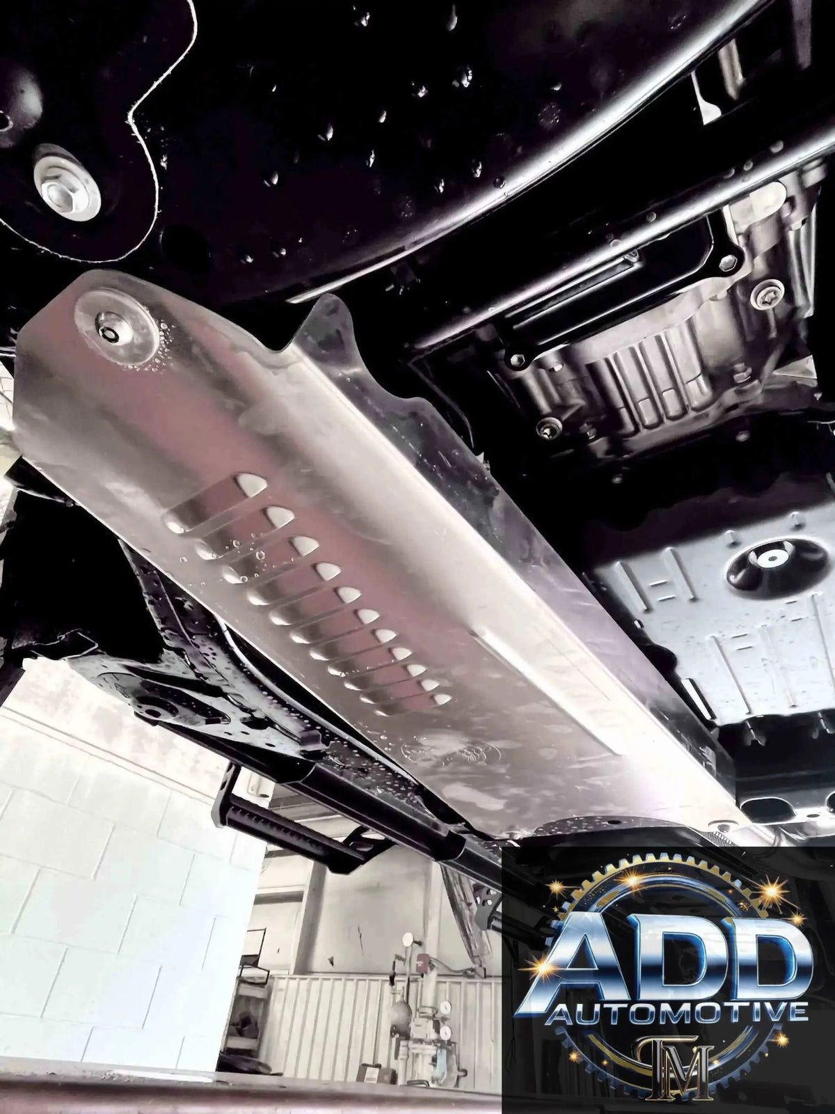 2024-2026 Toyota Tacoma Hybrid catalytic converter shield made of marine grade aluminum with louvers and security bolts installed under the vehicle