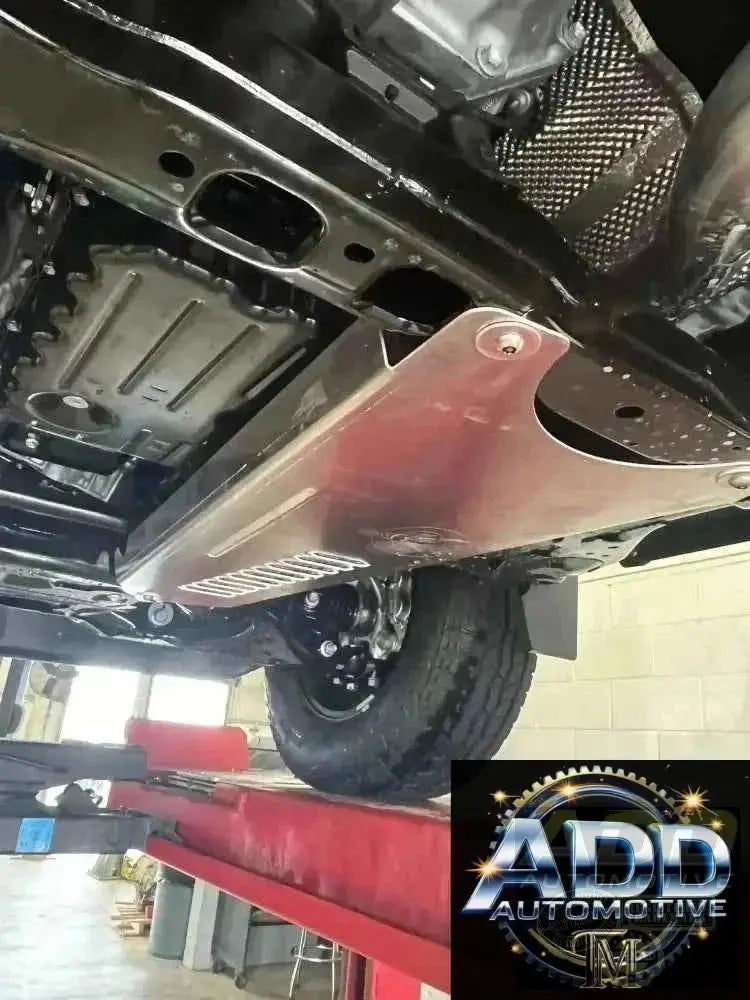2024-2026 Toyota Tacoma catalytic converter shield marine-grade aluminum anti-theft design with louvered ventilation and security bolts