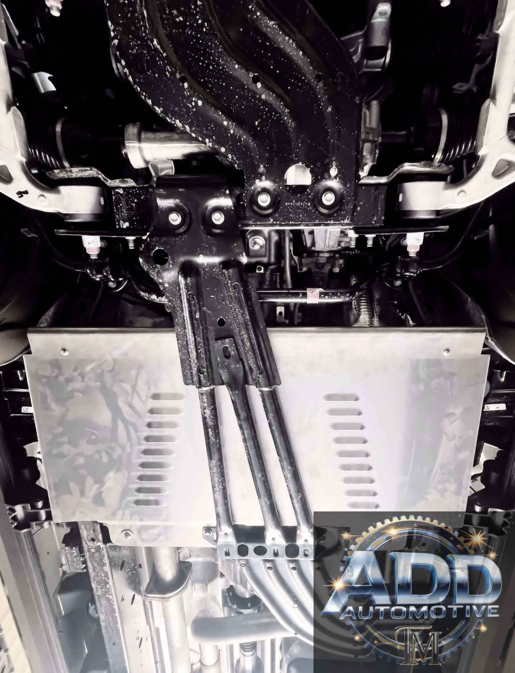 2025-2026 Ram 1500 catalytic converter shield installed under truck with louvers and security bolts